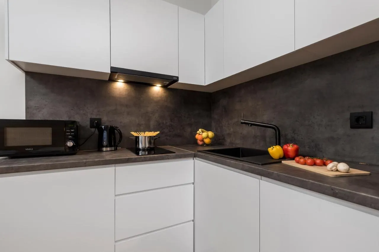 Deluxe Apartments & Rooms 